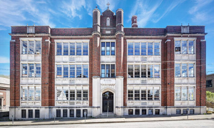 3 Men Buy Abandoned High School and Turn It Into Luxury Apartments—Here's How It Looks Now