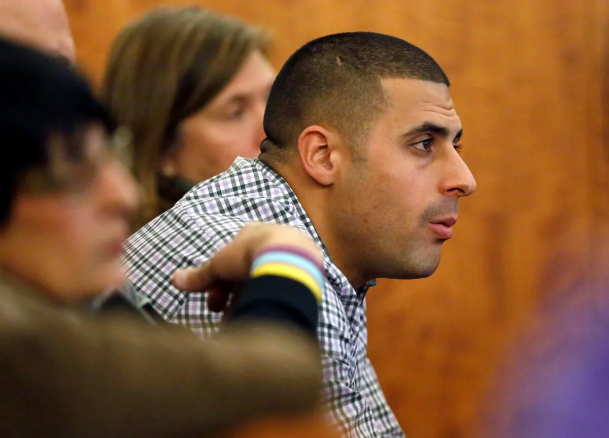 Dennis Hernandez, brother of former New England Patriots NFL football player Aaron Hernandez, watches during his brother's murder trial in Fall River, Mass., on Jan. 29, 2015. (Steven Senne/Pool/AP Photo)