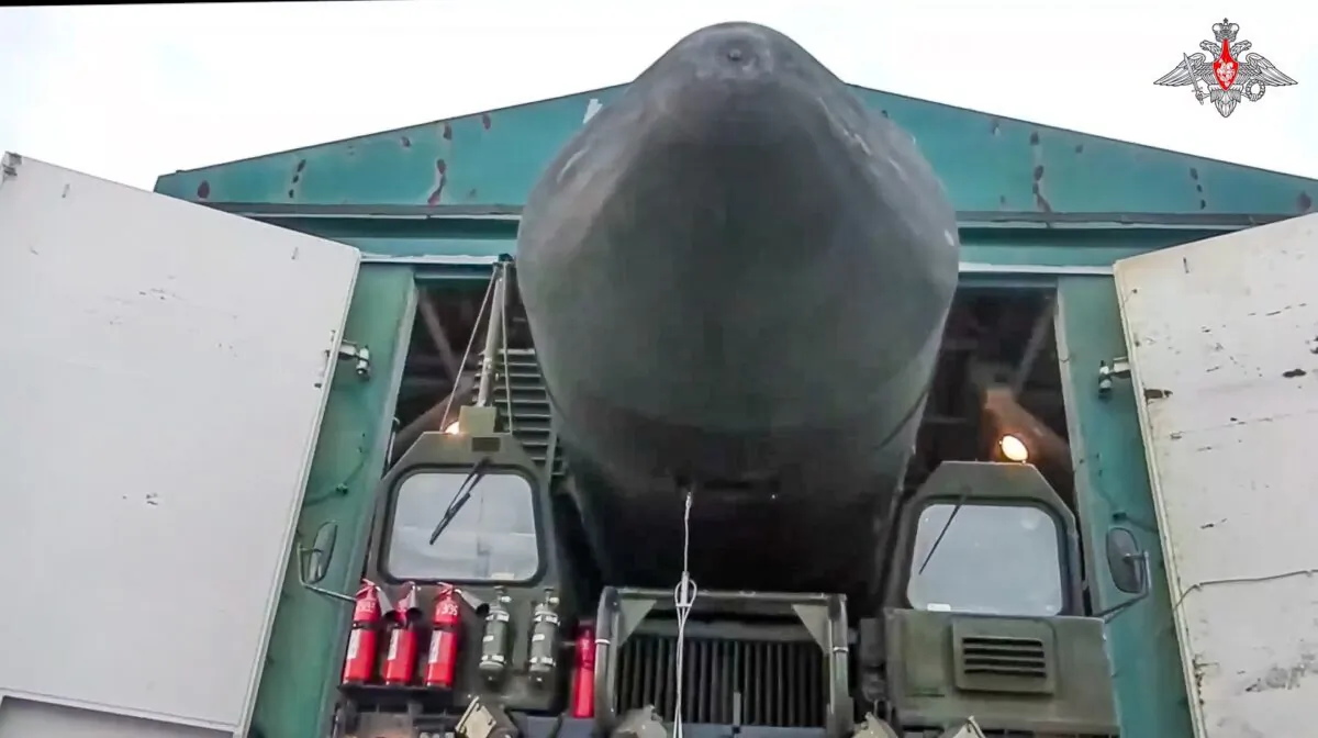 A Yars missile launcher of the Russian armed forces is driven from a shelter in an undisclosed location in Russia in a still from video provided on March 29, 2023. (Russian Defense Ministry Press Service via AP)