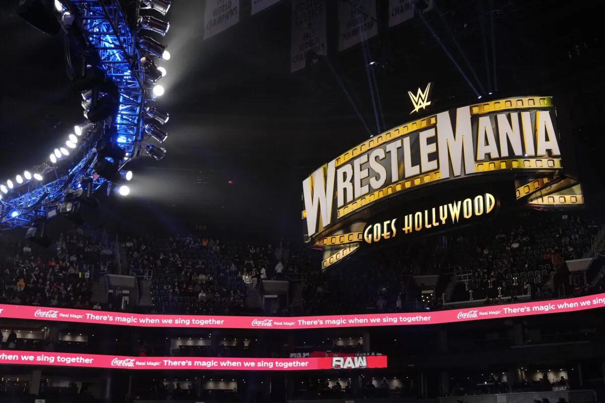 A WrestleMania sign hangs over the crowd during the WWE Monday Night RAW event in Boston on March 6, 2023. (Charles Krupa/AP Photo)