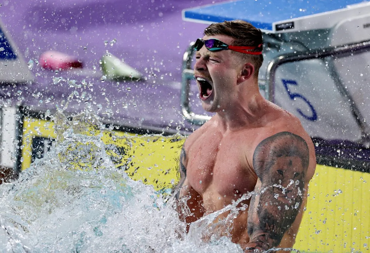 England's Adam Peaty celebrates after winning gold in the Men's 50m Breaststroke Final on day five of the Birmingham 2022 Commonwealth Games at Sandwell Aquatics Centre in Smethwick, England, on Aug. 2, 2022. (Stoyan Nenov/Reuters)