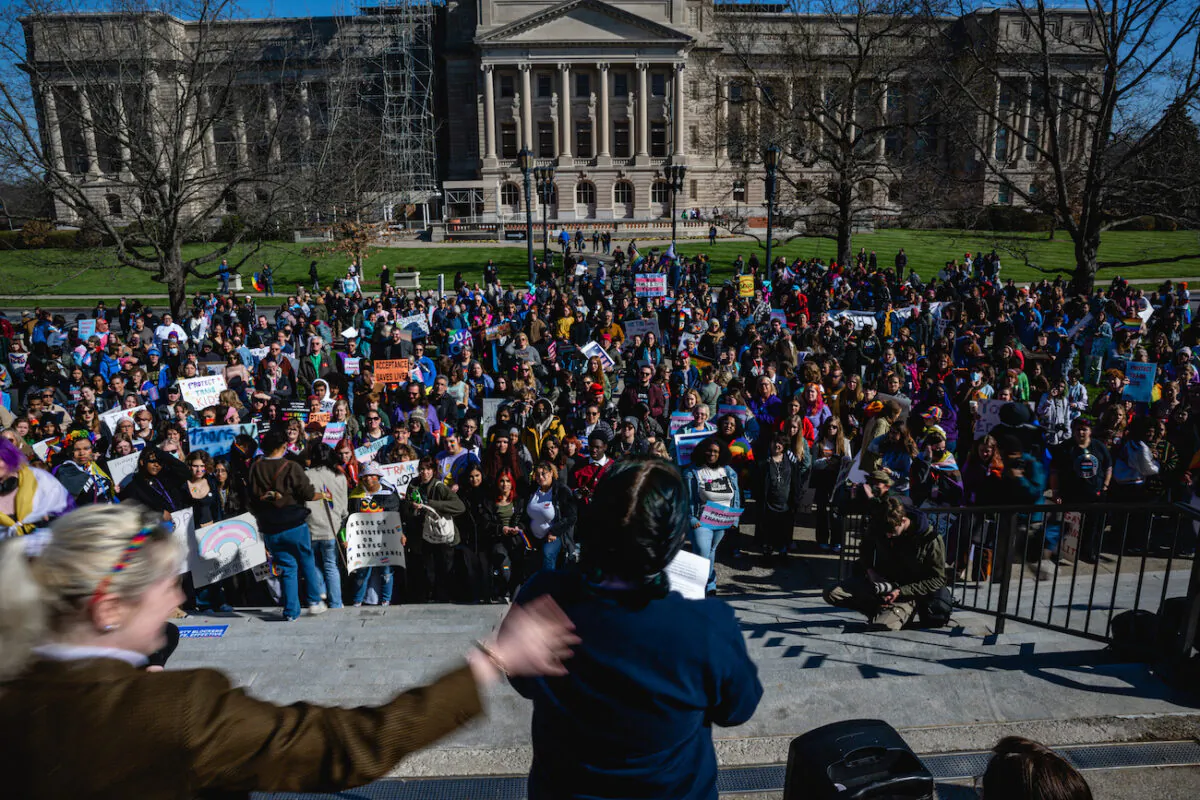 Opponents and supporters of transgender bill SB 150 rally at the Kentucky State Capitol in Frankfort, Ky., on March 29, 2023. (Jon Cherry/Getty Images)