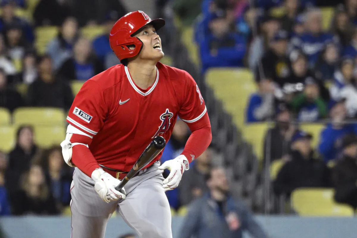Los Angeles Angels' Shohei Ohtani runs to first as he flies out during the sixth inning of a preseason baseball game against the Los Angeles Dodgers in Los Angeles on March 26, 2023. (Mark J. Terrill/AP Photo)