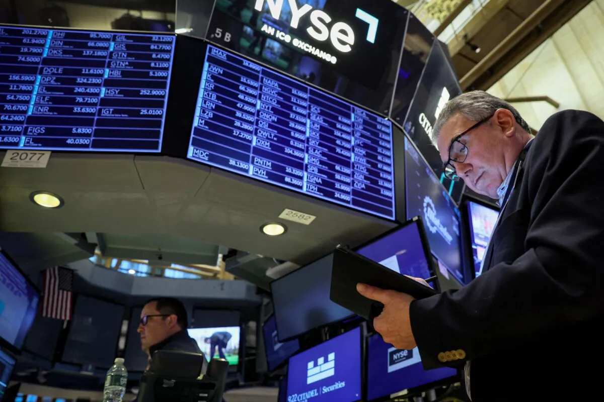 Traders work on the floor of the New York Stock Exchange in Manhattan on March 29, 2023. (Brendan McDermid/Reuters)