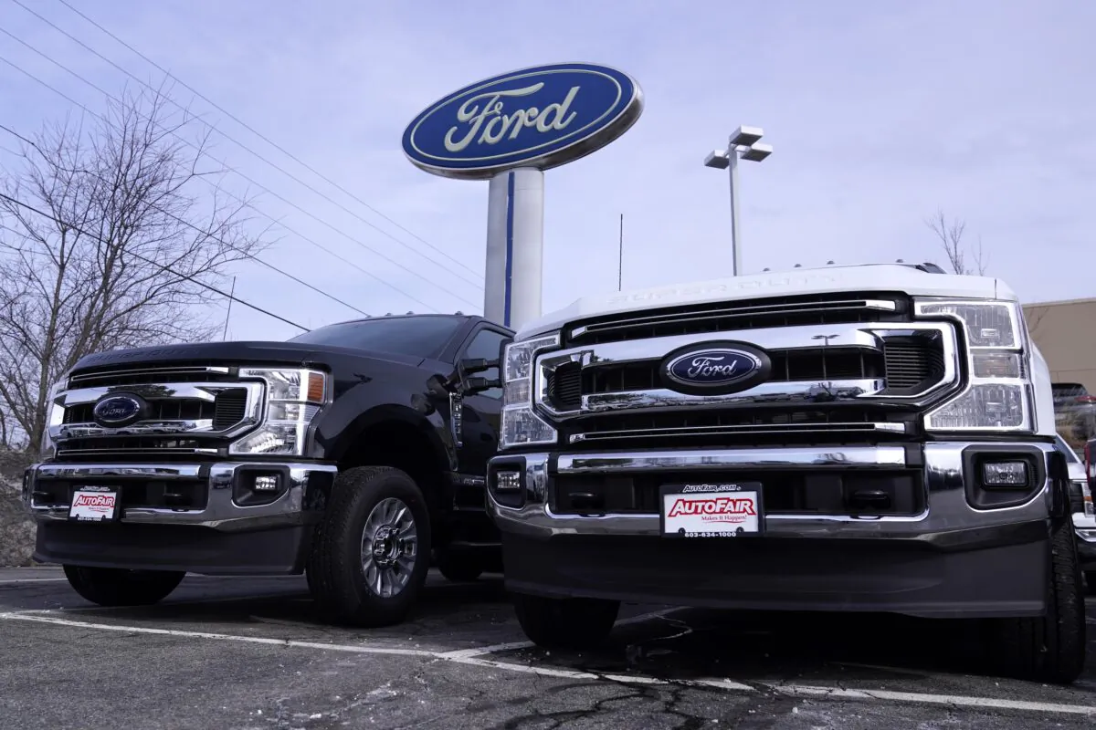 Ford pick-up trucks are displayed at a dealership in Manchester, N.H., on Feb. 6, 2023. (Charles Krupa/AP Photo)