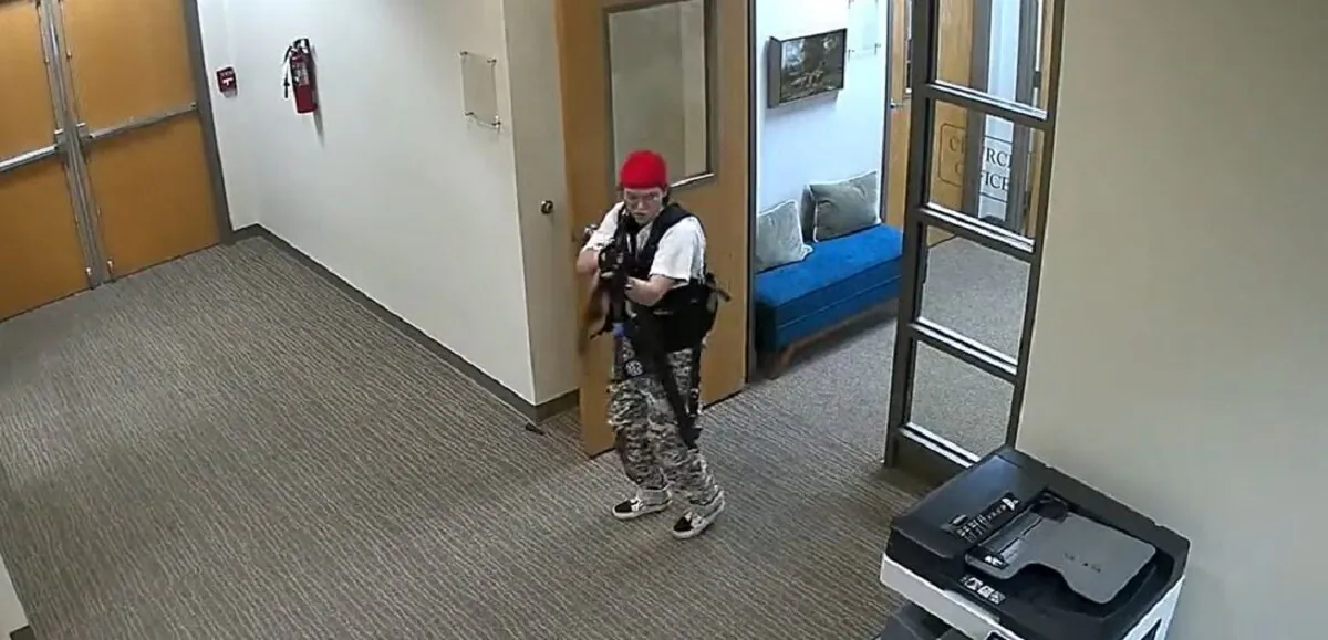 Audrey Hale points a gun inside The Covenant School in Nashville, Tenn., on March 27, 2023. (Nashville Police Department via The Epoch Times)