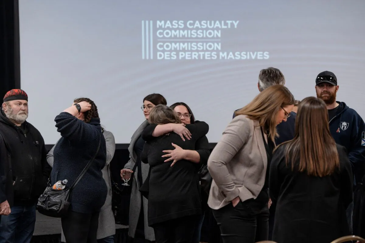 Family, friends, and supporters of the victims of the mass killings in rural Nova Scotia in 2020 gather following the release of the Mass Casualty Commission inquiry's final report in Truro, N.S,. on March 30, 2023. (The Canadian Press/Darren Calabrese)