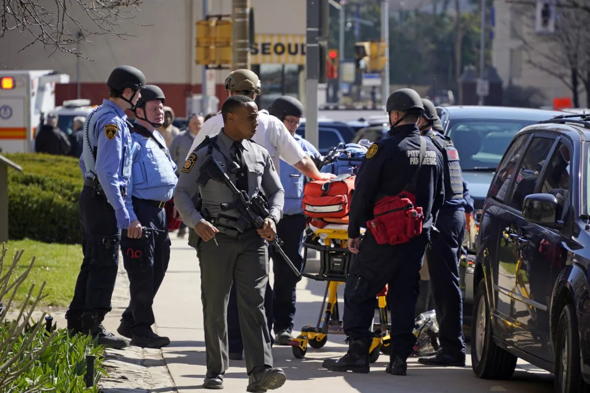 Pittsburgh Police and paramedics respond to Pittsburgh Central Catholic High School for what turned out to be a hoax report of an active shooter in the Oakland neighborhood of Pittsburgh on March 29, 2023. (Gene J. Puskar/AP Photo)