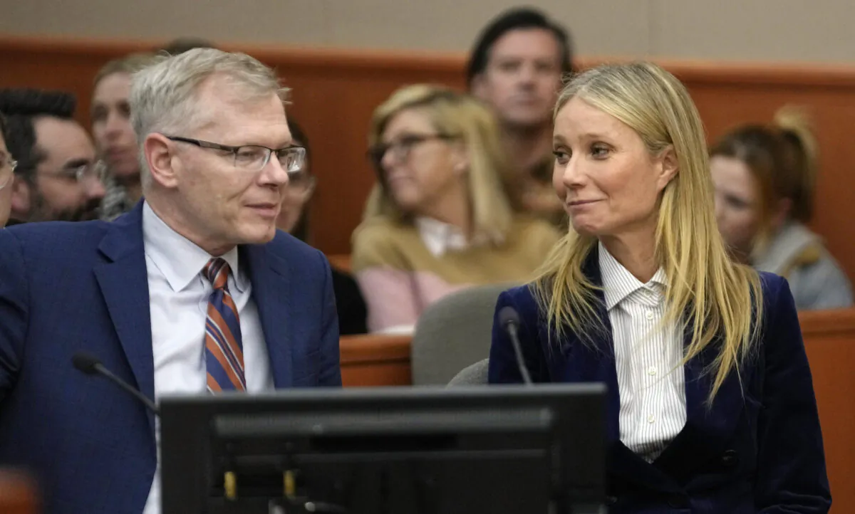 Gwyneth Paltrow (R) and her attorney Steve Owens smile after the reading of the verdict in her lawsuit trial in Park City, Utah, on March 30, 2023. (Rick Bowmer/AP Photo, Pool)