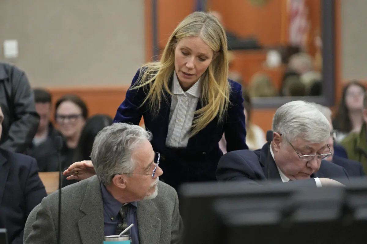 Gwyneth Paltrow speaks with retired optometrist Terry Sanderson (L) as she walks out of the courtroom following the reading of the verdict in their lawsuit trial in Park City, Utah, on March 30, 2023. (Rick Bowmer/AP Photo, Pool)