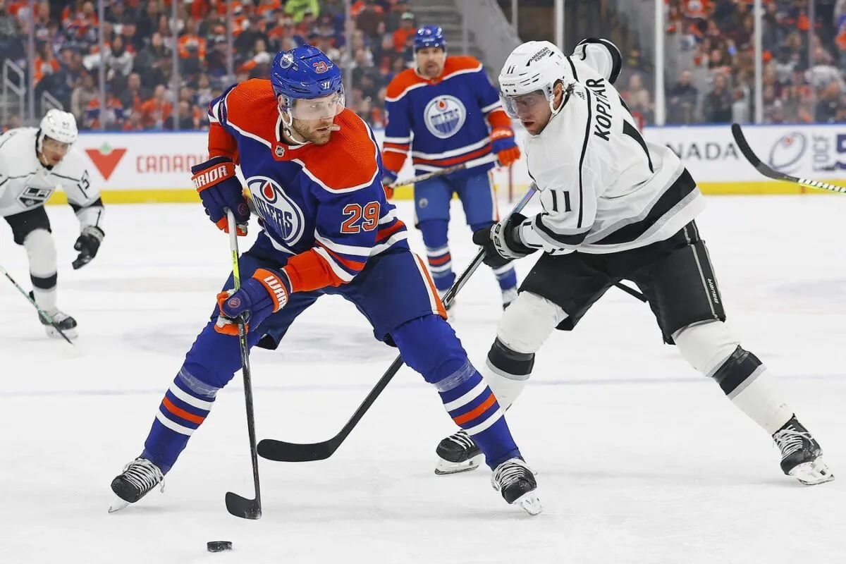 Edmonton Oilers forward Leon Draisaitl (29) protects the puck from Los Angeles Kings forward Anze Kopitar (11) during the first period at Rogers Place in Edmonton, Alberta, Canada, on March 30, 2023. (Perry Nelson/USA TODAY Sports via Field Level Media)