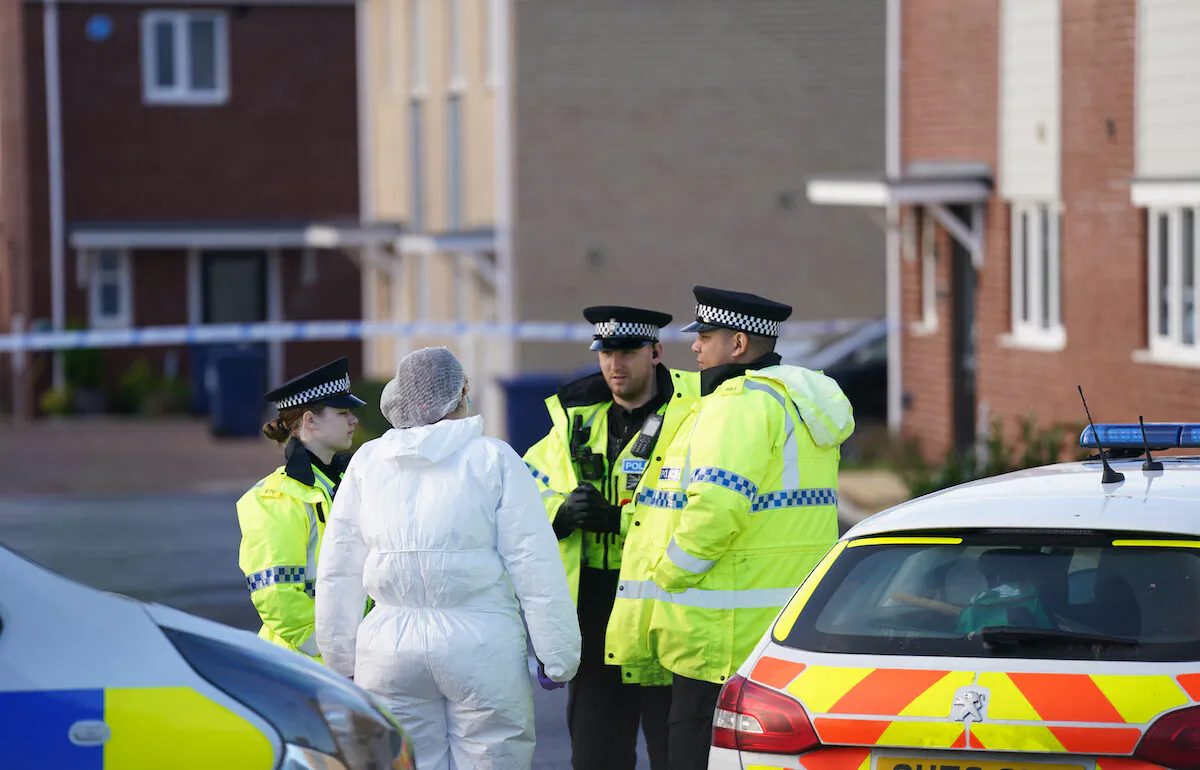 Police and forensics at the scene in Meridian Close in Bluntisham, Cambridgeshire, on Mar. 30, 2023. (PA Media)