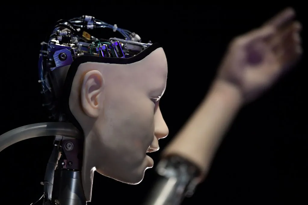 An AI robot titled "Alter 3: Offloaded Agency," is pictured during a photocall to promote the forthcoming exhibition titled "AI: More than Human," at the Barbican Centre in London, on May 15, 2019. (Ben Stansall/AFP via Getty Images)