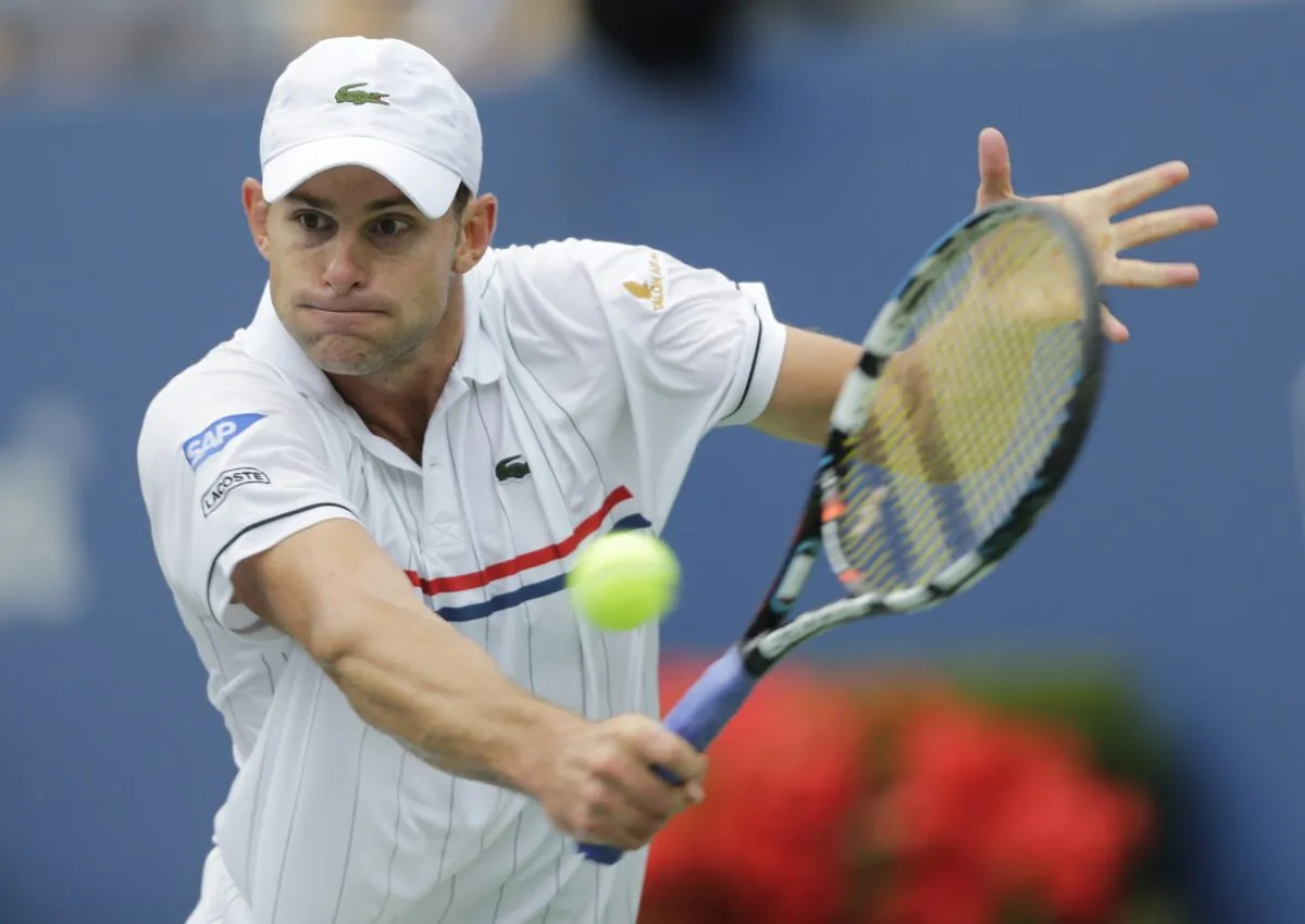 Andy Roddick returns a shot to Italy's Fabio Fognini in the third round of play at the 2012 U.S. Open tennis tournament in New York on Sept. 2, 2012. (Mike Groll/AP Photo)