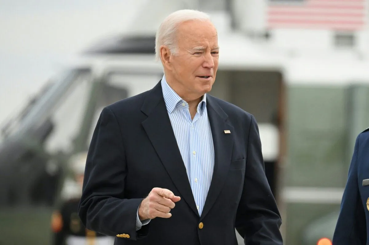 President Joe Biden makes his way to board Air Force One before departing from Joint Base Andrews in Md. on March 31, 2023. (Mandel Ngan/AFP via Getty Images)