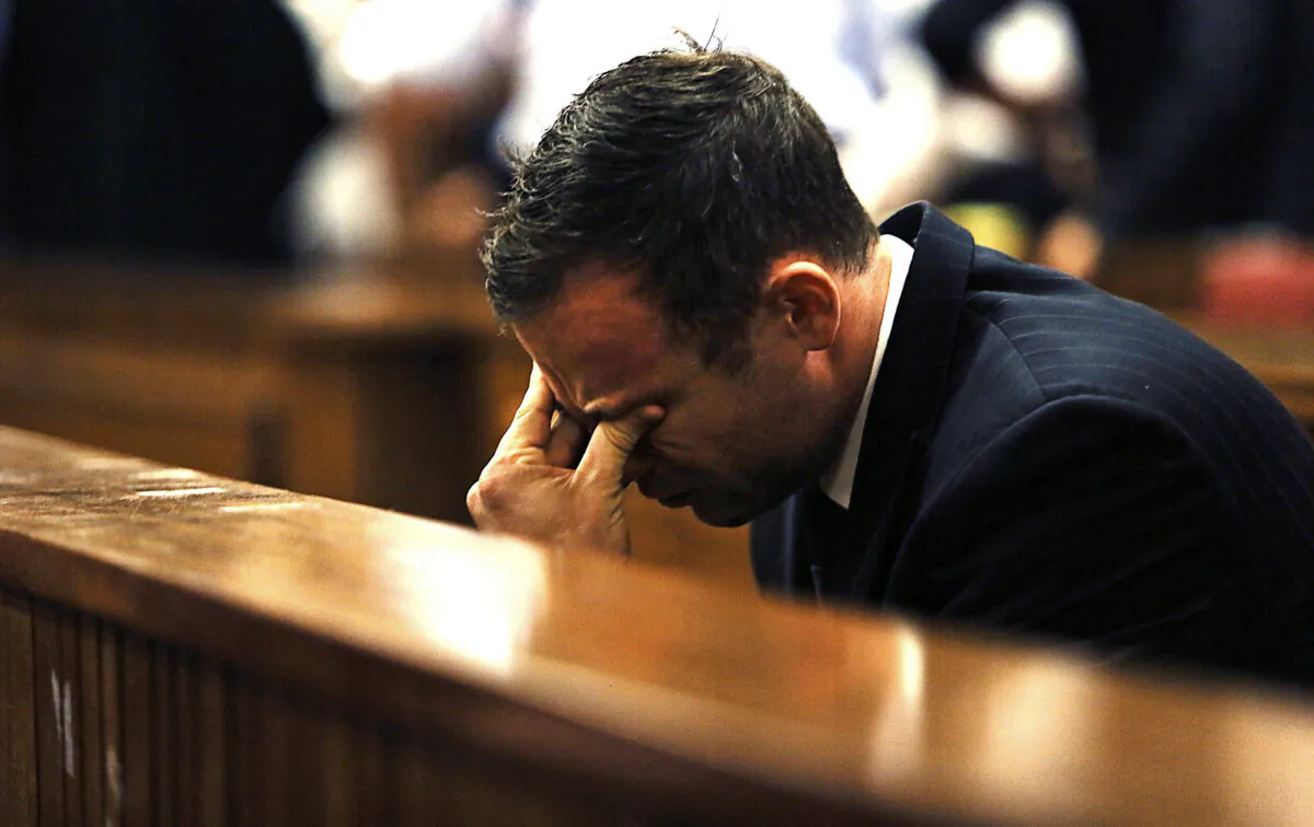 Olympic and Paralympic track star Oscar Pistorius reacts as Judge Thokozile Masipa (unseen) delivers her verdict at the North Gauteng High Court in Pretoria, South Africa, on Sept. 12, 2014. (Alon Skuy/Reuters/Pool)