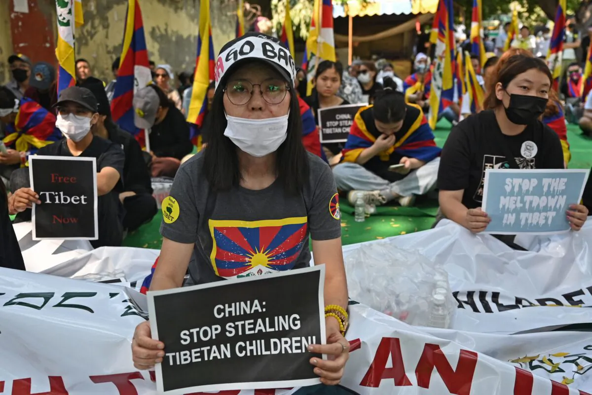 Tibetans living in exile gather to observe the Tibetan uprising anniversary in New Delhi on March 10, 2023. (Arun Sankar/AFP via Getty Images)