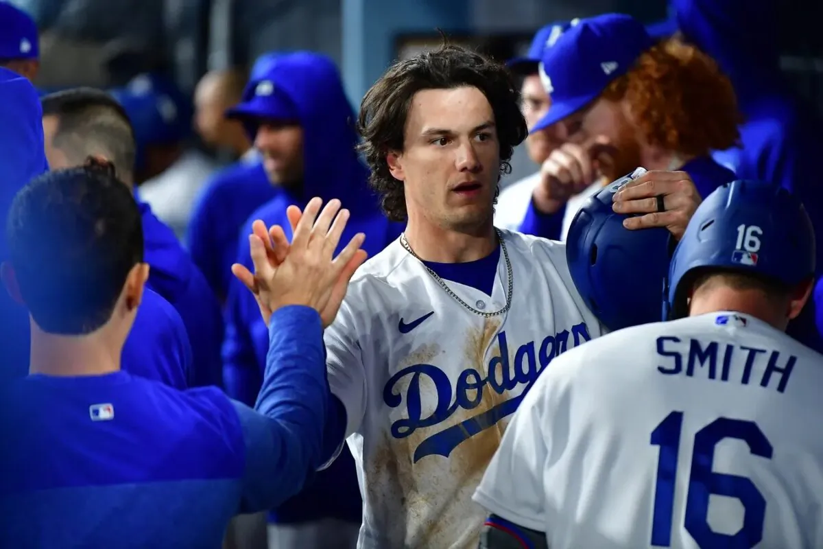 Los Angeles Dodgers center fielder James Outman (33) is greeted after scoring a run against the Arizona Diamondbacks during the eighth inning at Dodger Stadium in Los Angeles on March 30, 2023. (Gary A. Vasquez-USA TODAY Sports via Field Level Media)