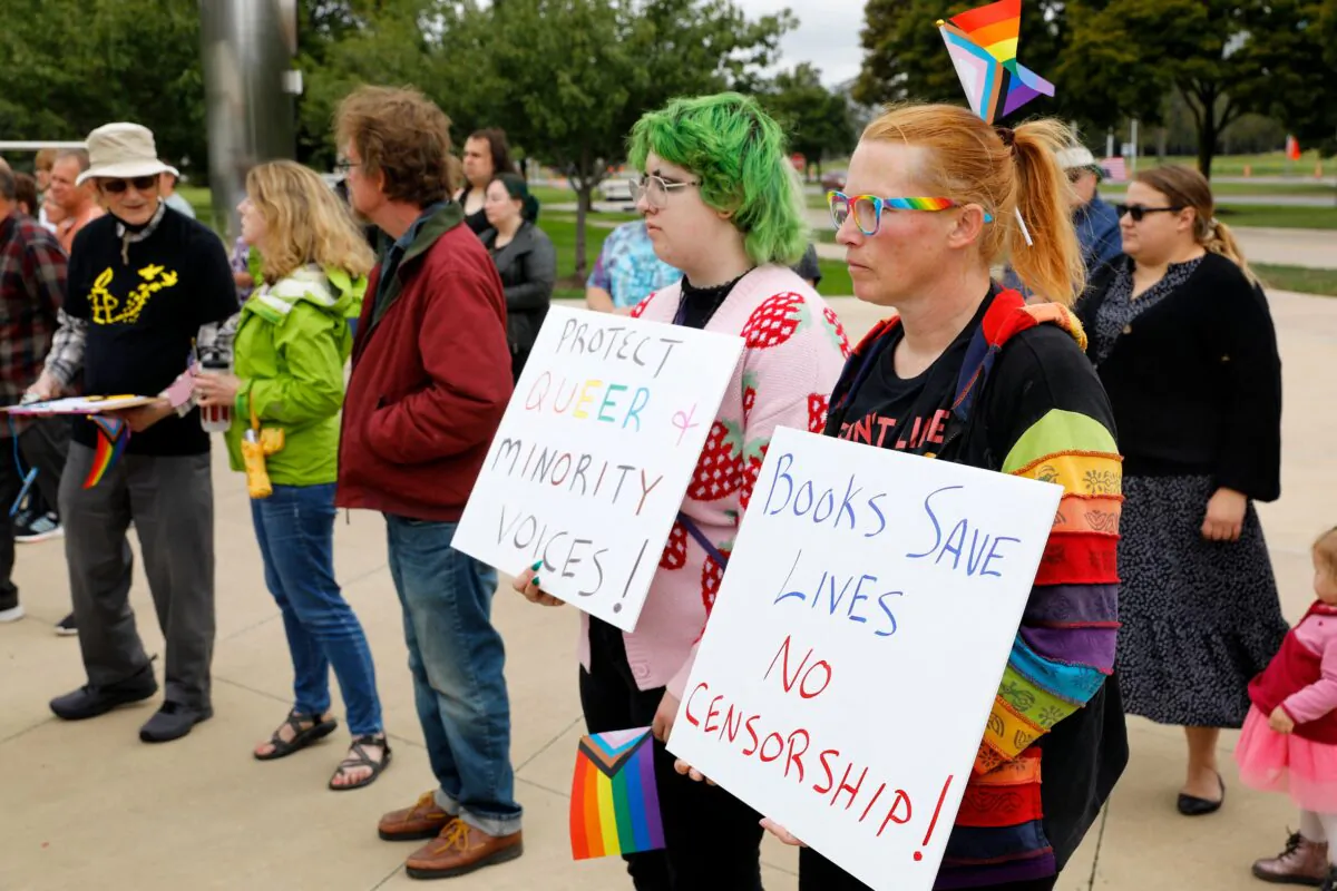 Demonstrators gather to protest against banning books outside of the Henry Ford Centennial Library in Dearborn, Mich., on Sept. 25, 2022. (Jeff Kowalky/AFP via Getty Images)