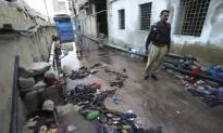 Stampede at Food Distribution Center Kills 12 in Pakistan