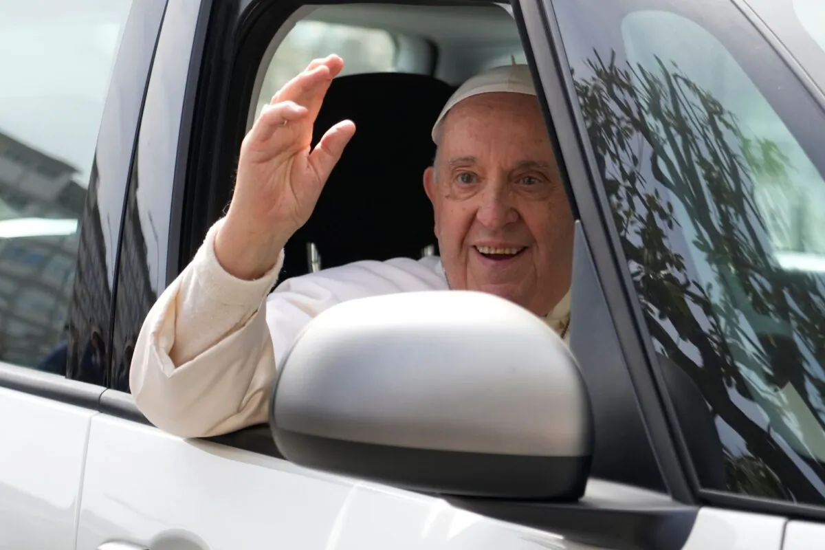 Pope Francis waves from his car as he leaves the Agostino Gemelli University Hospital in Rome on April 1, 2023. (Gregorio Borgia/AP Photo)