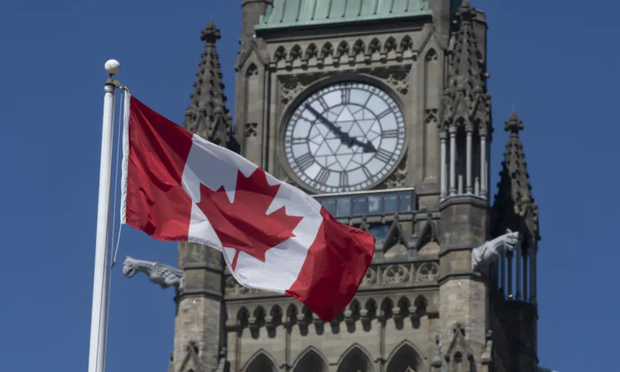 The Canadian flag flies near the Peace Tower on Parliament Hill in Ottawa on June 17, 2020. (Adrian Wyld/The Canadian Press)