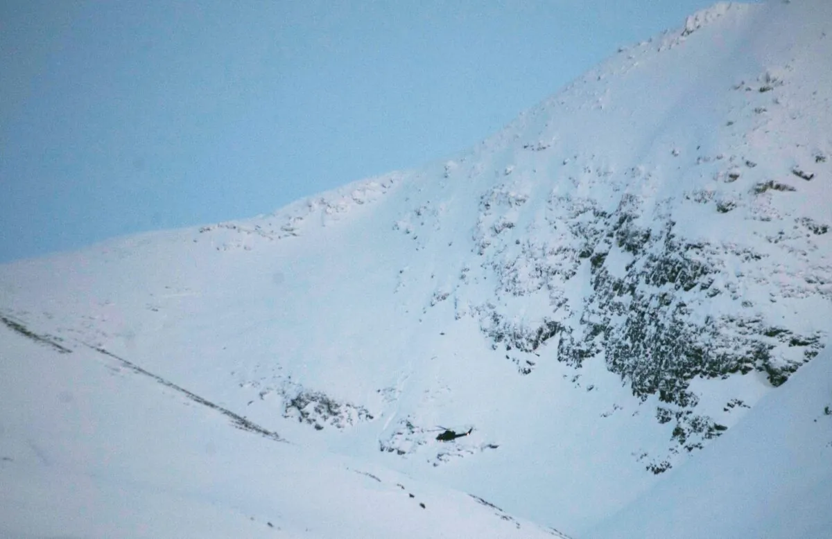 A rescue services helicopter heads for the site of an avalanche in northern Norway in a file photo. (Jan-Morten Bjornbakk/AFP via Getty Images)