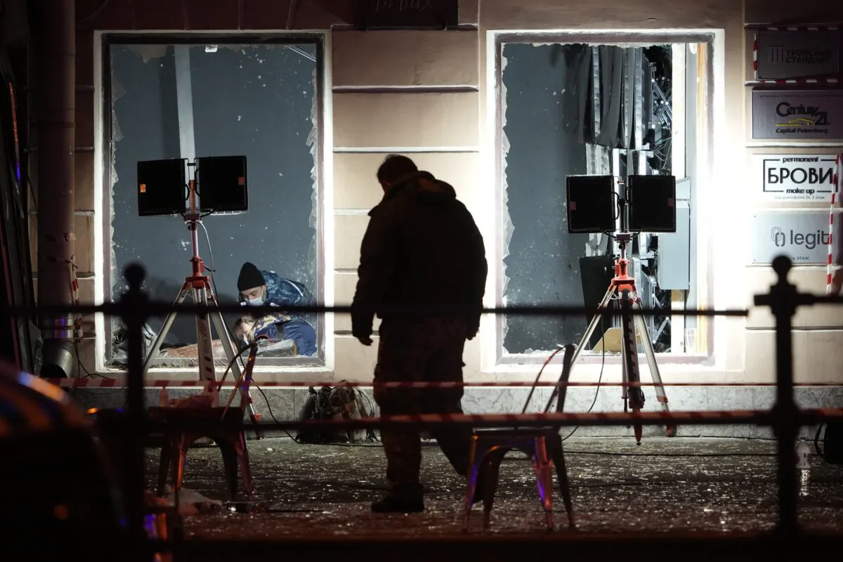 Russian investigators work at the site of an explosion at a cafe in St. Petersburg, Russia, on April 2, 2023. (AP Photo)