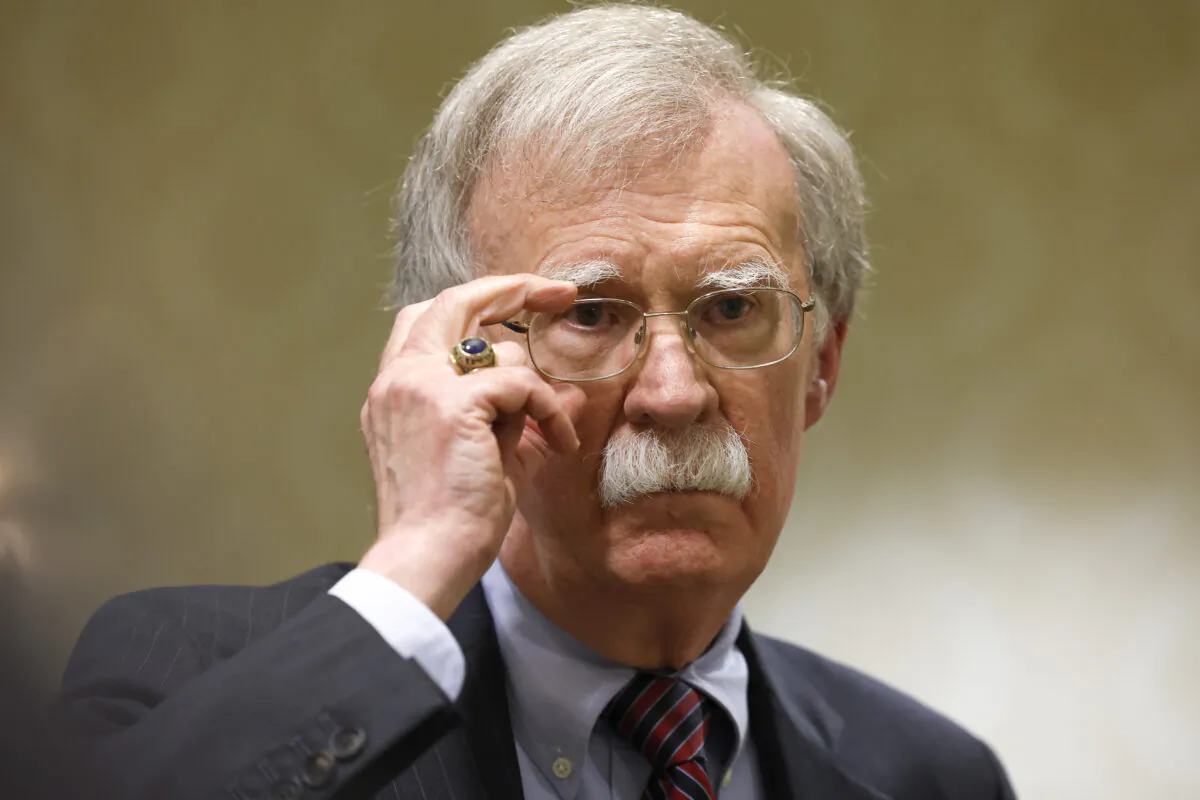 Former National Security Adviser John Bolton speaks to reporters after speaking in a panel hosted by the National Council of Resistance of Iran–U.S. Representative Office (NCRI-US) at the Willard InterContinental Hotel in Washington on Aug. 17, 2022. (Anna Moneymaker/Getty Images)