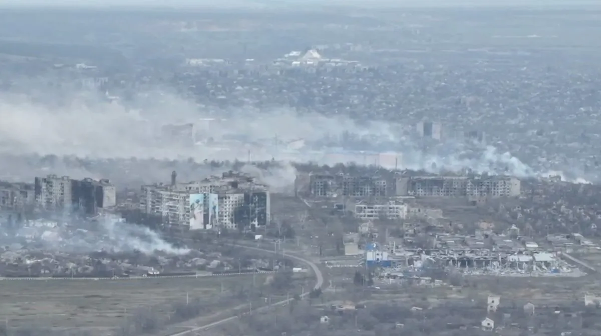 An aerial view shows smoke billowing, in Bakhmut, Ukraine, in a still image taken from an undated video obtained from social media. (@combat.art.ukraine via Instagram/via Reuters)