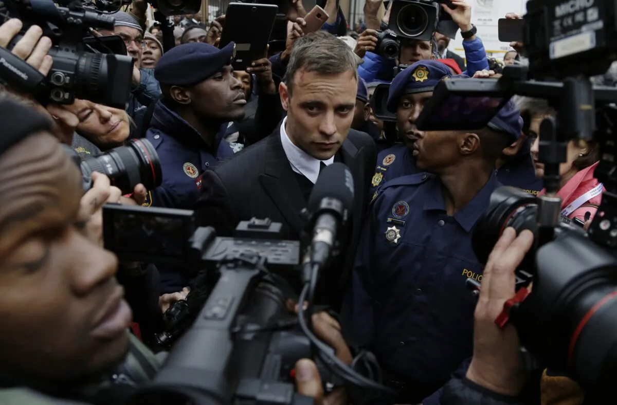 Oscar Pistorius leaves the High Court in Pretoria, South Africa, on June 14, 2016, during his trail for the murder of girlfriend Reeva Steenkamp. (Themba Hadebe/AP Photo)