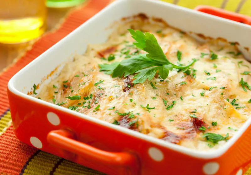 The filling adds a burst of flavor to the simple sliced potatoes. (Allan Rosenberg/TNS)