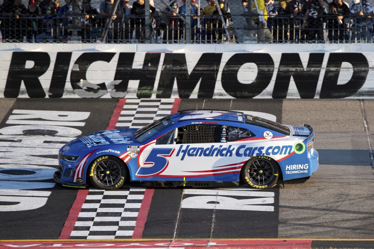 Kyle Larson (5) leads on the final lap during a NASCAR Cup Series auto race at Richmond Raceway in Richmond, Va., on April 2, 2023. (Mike Caudill/AP Photo)