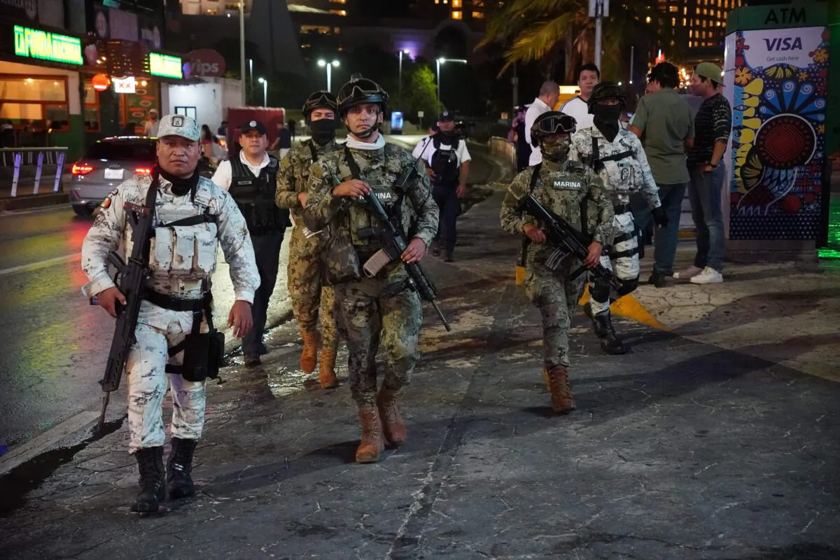 Members of the Mexican Navy and National Guard patrol the tourist area of Cancun, Quintana Roo state, Mexico, on March 17, 2023. (Elizabeth Ruiz/AFP via Getty Images)