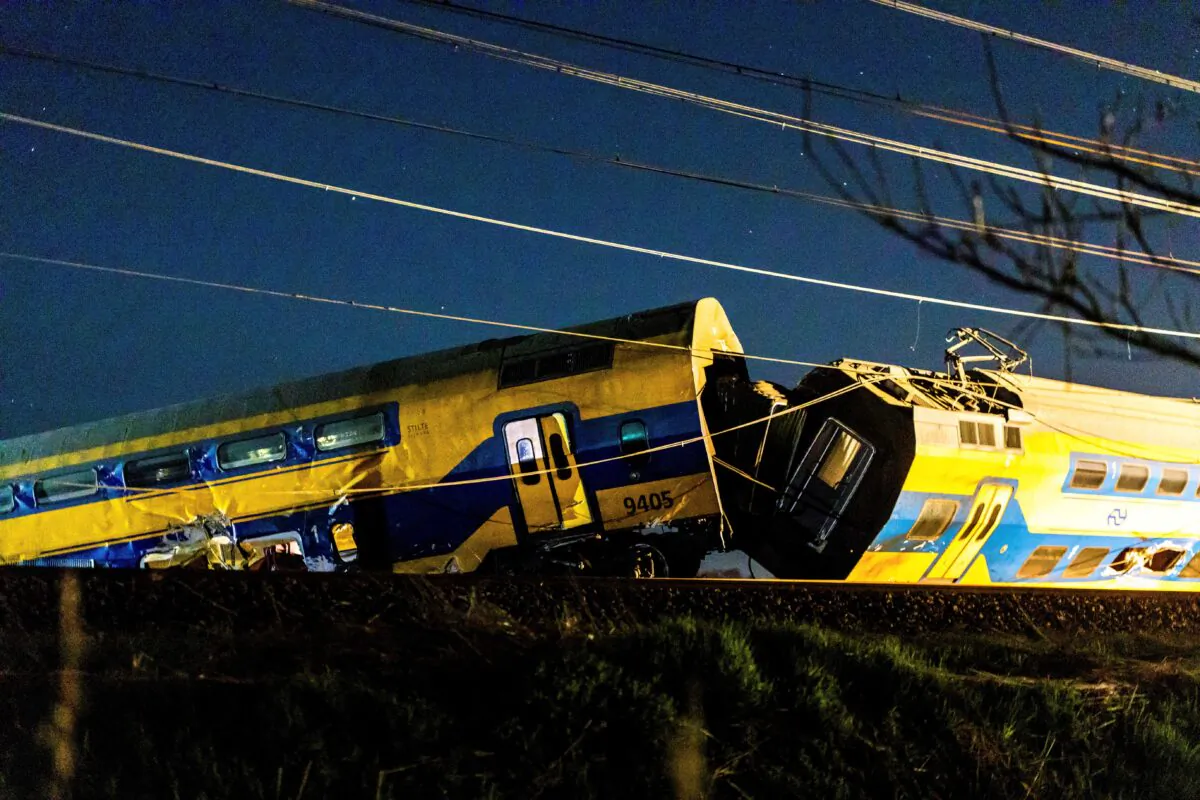 Aftermath following the derailment of a passenger train after it hit construction equipment on the track in Voorschoten, Netherlands, on April 4, 2023. (Kyrlian De Bot/via Reuters)