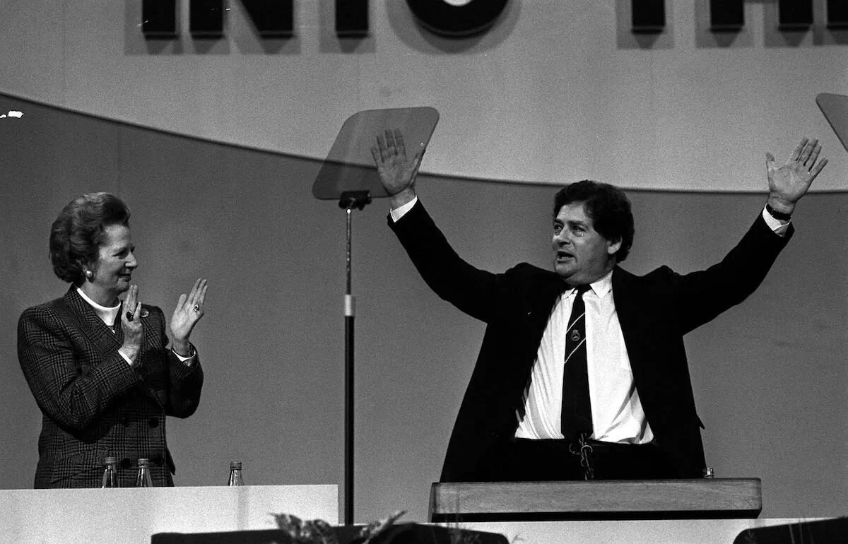 Then-Chancellor Nigel Lawson, applauded by Prime Minister Margaret Thatcher, at the end of his speech during the Conservative Party's annual conference in Brighton on Oct. 13, 1988. (PA)