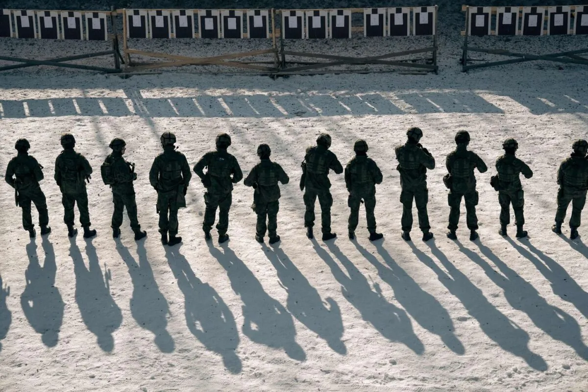 Finnish reservists of the Guard Jaeger Regiment stand at a shooting range as they take part in a military exercise at the Santahamina military base in Helsinki, Finland, on March 7, 2023. (Alessandro Rampazzo/AFP via Getty Images)