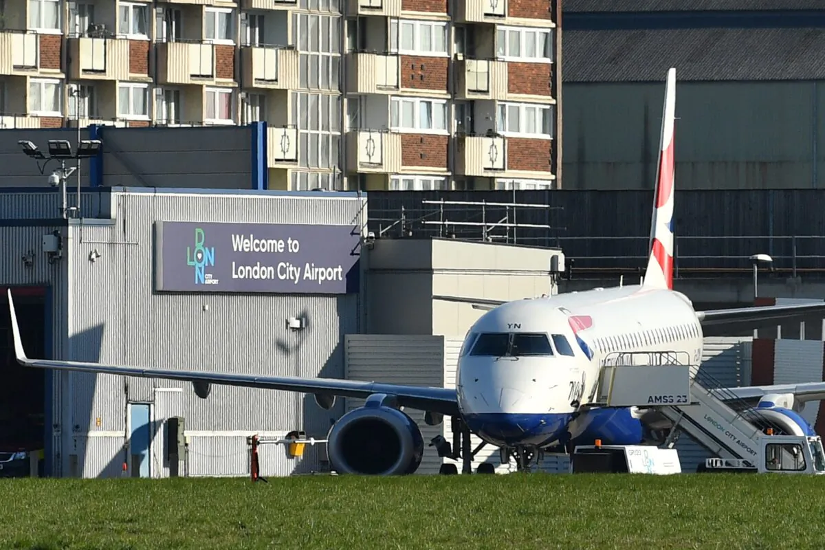 A British Airways passenger jet sits on the tarmac at London City Airport in east London on March 25, 2020. (Ben Stansall/AFP via Getty Images)
