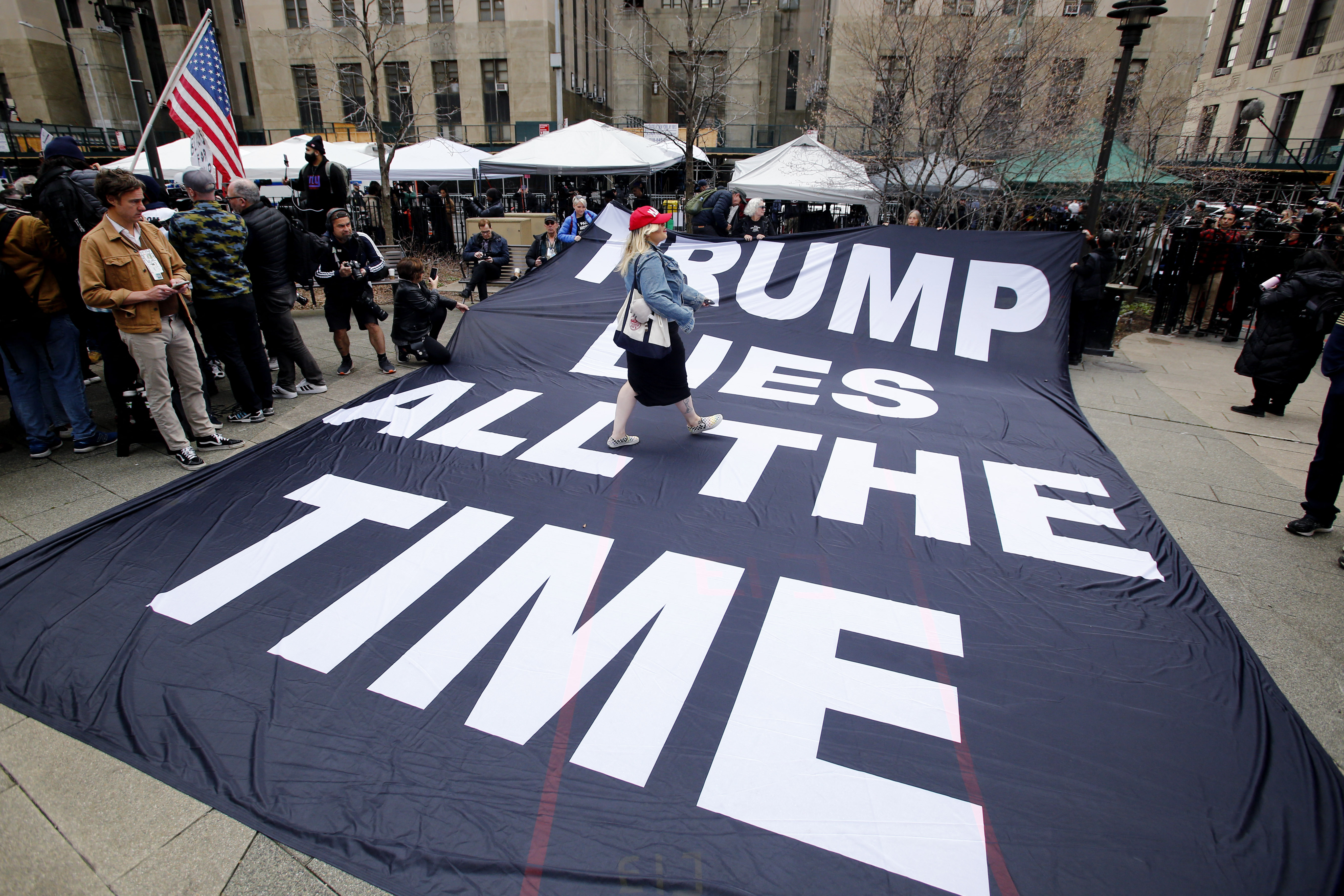 Photos: Protesters Rally Outside Manhattan Courthouse Ahead of Trump Arraignment - Vimarsana News