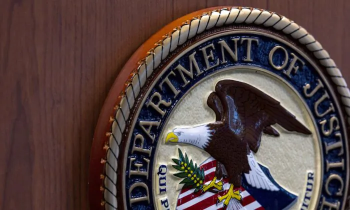 The Department of Justice emblem at the U.S. Attorney's Office for the Southern District of Florida in downtown Miami is pictured on Jan. 25, 2023. (D.A. Varela/Miami Herald via AP)
