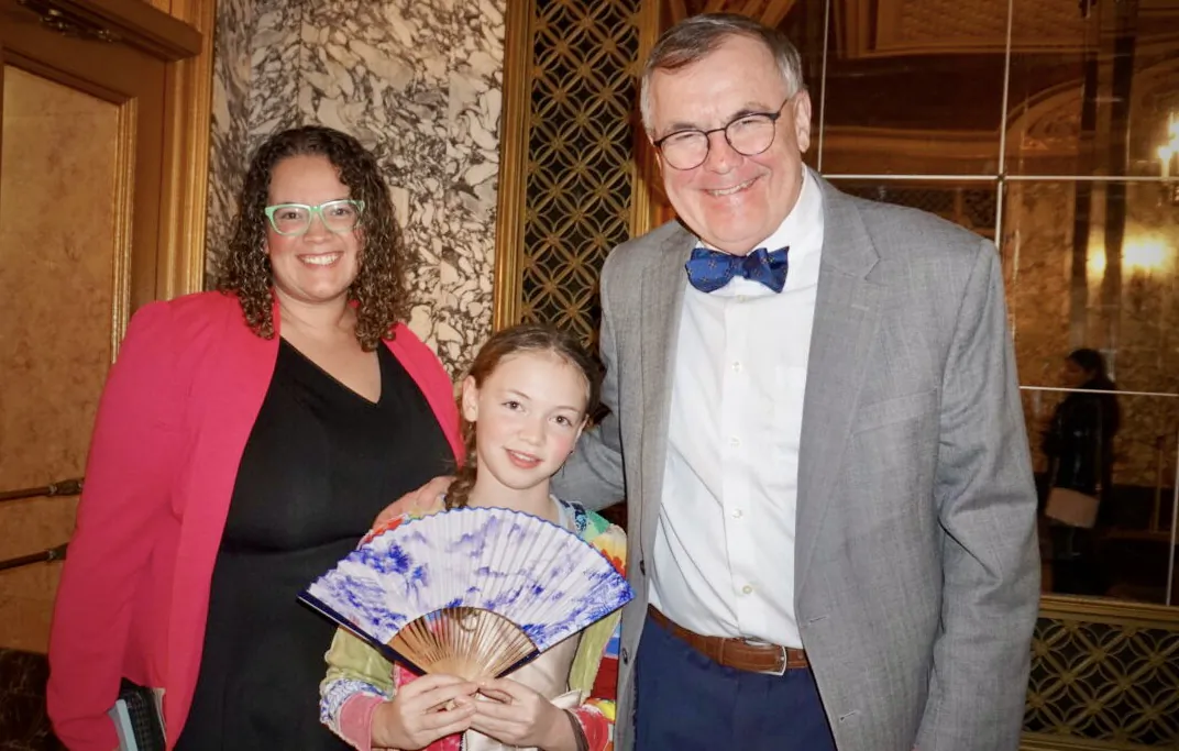 Ed Morse with his daughter in law and granddaughter at the Shen Yun Performing Arts performance at  Orpheum Theater, in Omaha, on April 3, 2023. (Sally Sun/TheEpoch Times)
