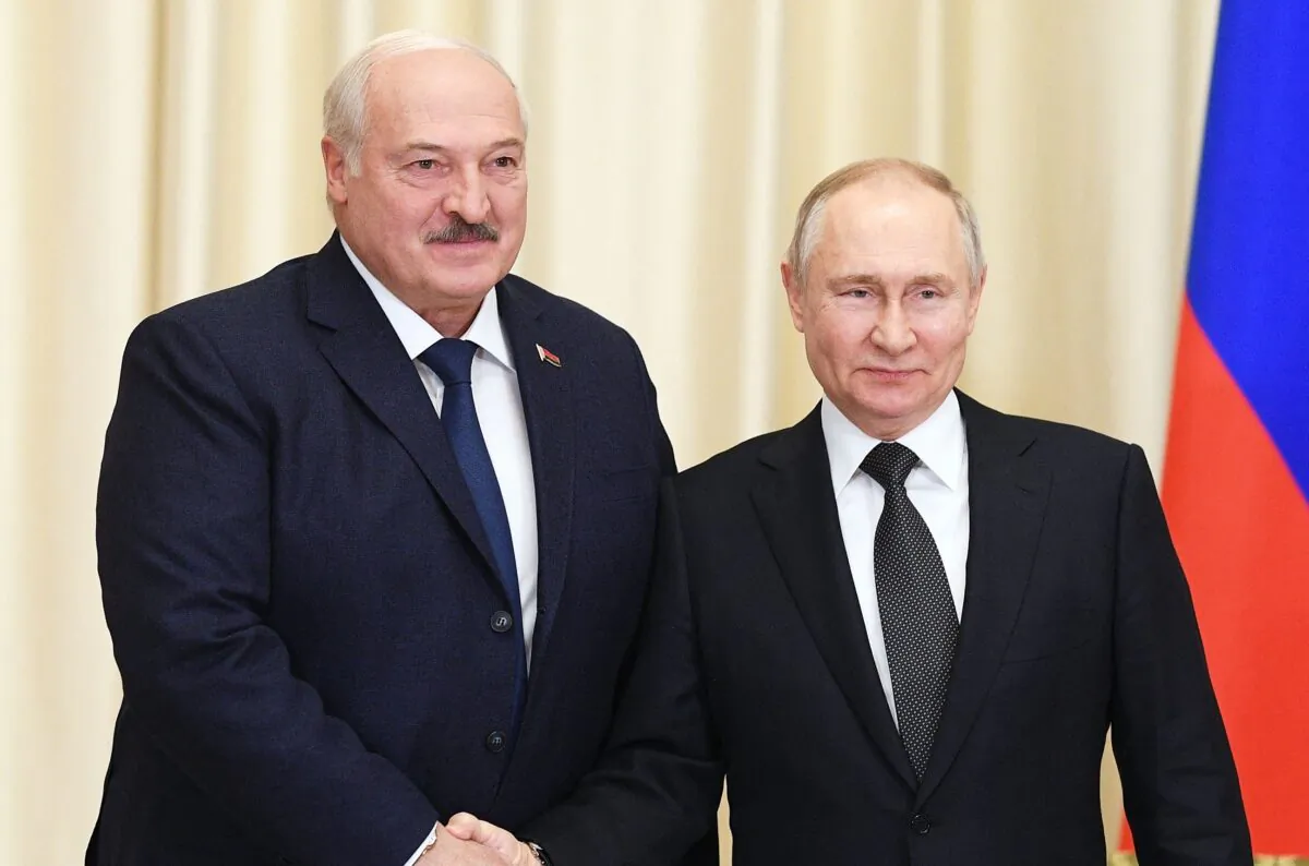 Russian President Vladimir Putin (R) meets with his Belarusian counterpart Alexander Lukashenko at the Novo-Ogaryovo state residence, outside Moscow, on Feb. 17, 2023. (Vladimir Astapkovich/Sputnik/AFP via Getty Images)