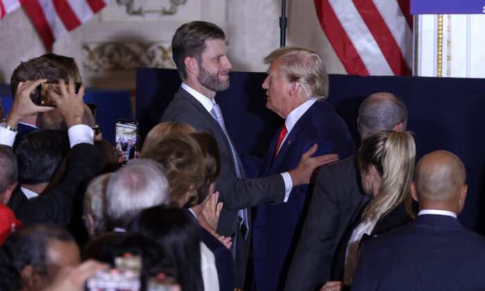 Former President Donald Trump (R) talks with son Eric Trump (L) during an event at Mar-a-Lago in West Palm Beach, Florida, on April 4, 2023. (Alex Wong/Getty Images)