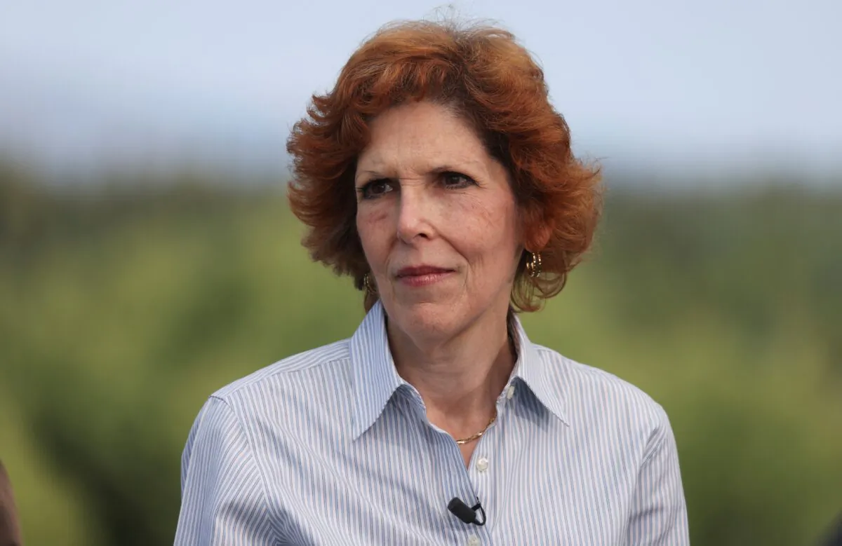 Loretta J. Mester, president and CEO of the Federal Reserve Bank of Cleveland, looks on at Teton National Park where financial leaders from around the world gathered for the Jackson Hole Economic Symposium outside Jackson, Wyo., on Aug. 26, 2022. (Jim Urquhart/Reuters)