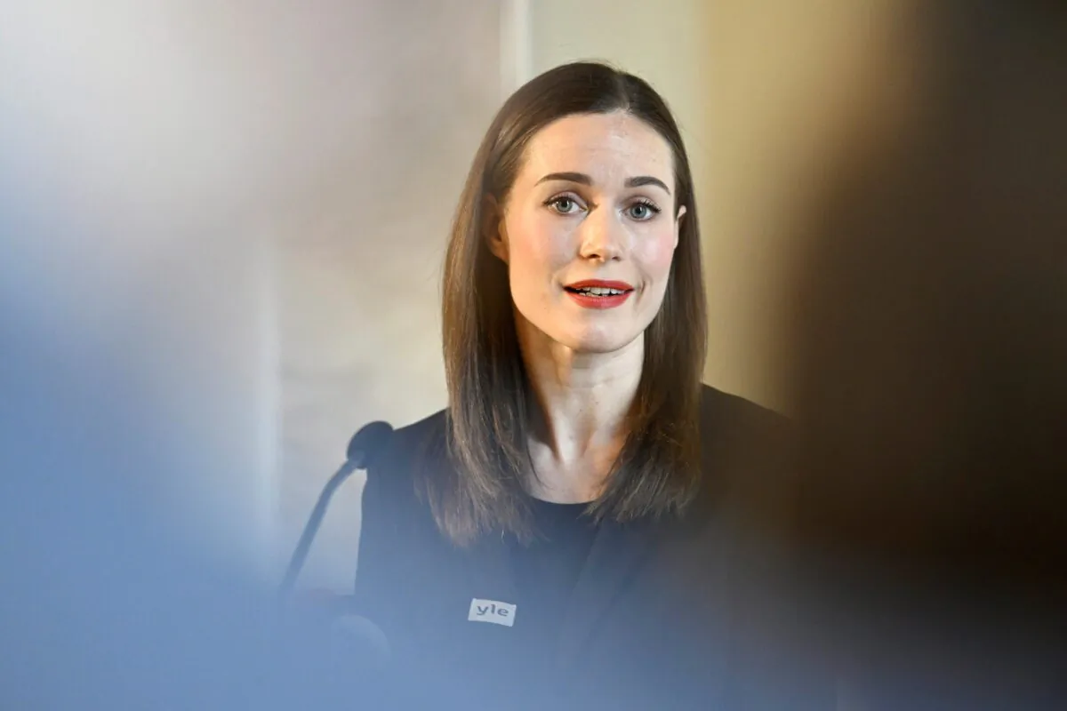 Social Democratic Party SDP chair and Finnish Prime Minister Sanna Marin talks to the media at the Parliament in Helsinki on April 5, 2023. (Heikki Saukkomaa/Lehtikuva via AP)