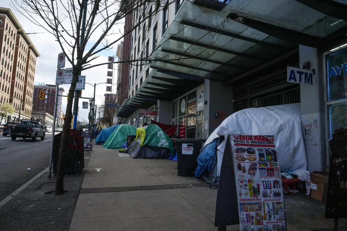 Tents are seen on the sidewalk in the Downtown Eastside of Vancouver, B.C., Apr. 3, 2023. (The Canadian Press/Darryl Dyck)