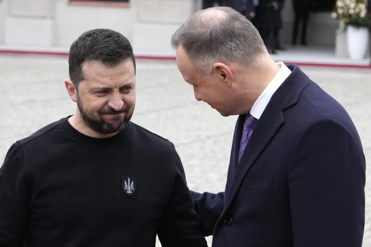 Poland's President Andrzej Duda (R) welcomes Ukrainian President Volodymyr Zelenskyy as they meet at the Presidential Palace in Warsaw, Poland, on April 5, 2023. (Czarek Sokolowski/AP Photo)