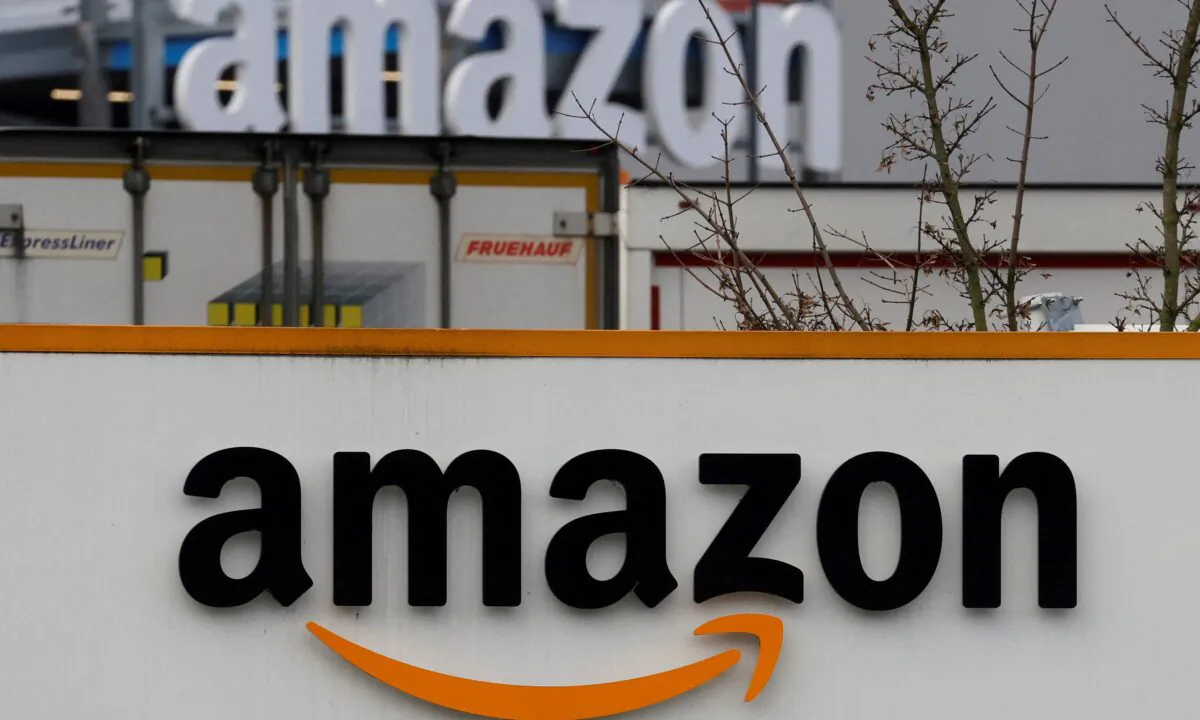 The logo of Amazon at the company logistics center in Lauwin-Planque, northern France, on Jan. 5, 2023. (Pascal Rossignol/Reuters)