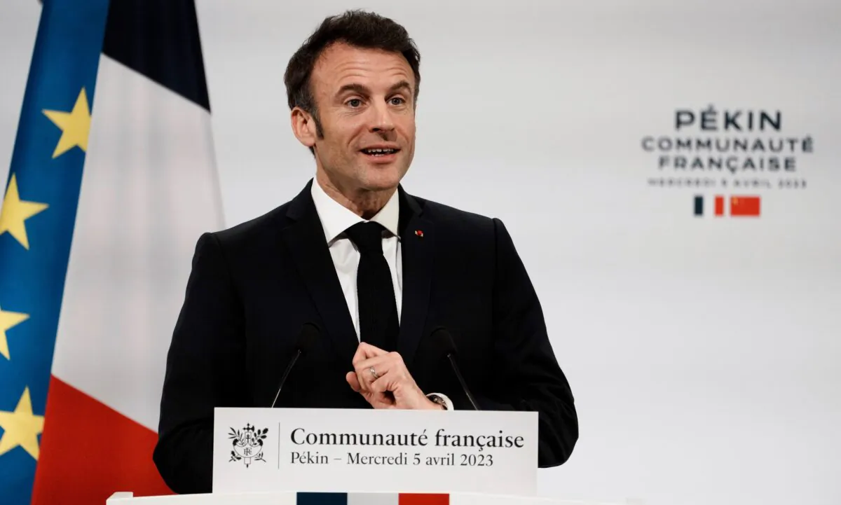French President Emmanuel Macron gives a speech as he meets members of the French community in Beijing, China on April 5, 2023. (Thibault Camus/AP Photo)