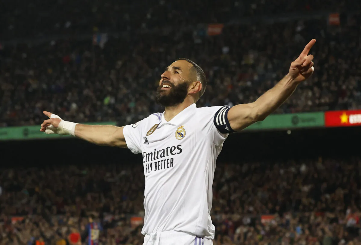 Real Madrid's Karim Benzema celebrates scoring their fourth goal to complete his hat-trick during the opa del Rey Semi Final Second Leg - FC Barcelona v Real Madrid soccer match at Camp Nou inBarcelona, Spain, on April 5, 2023. (Albert Gea/Reuters)